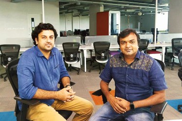 Zappyhire founders Deepu Xavier (L) and Jyothis KS