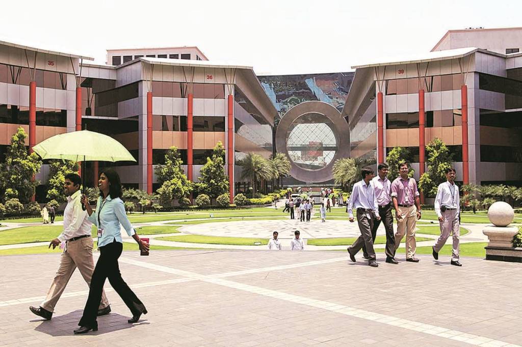 People walk through Infosys Technologies Ltd. headquarters in Bangalore, India, on Tuesday, April 13, 2010. Infosys Technologies Ltd., India's second-largest software exporter, reported fourth-quarter profit that was in-line with analysts' estimates as the global economic recovery spurred orders for its services. Photographer: Namas Bhojani/Bloomberg People walk through Infosys Technologies Ltd. headquarters in Bangalore, India, on Tuesday, April 13, 2010. Infosys Technologies Ltd., India's second-largest software exporter, reported fourth-quarter profit that was in-line with analysts' estimates as the global economic recovery spurred orders for its services. Photographer: Namas Bhojani/Bloomberg