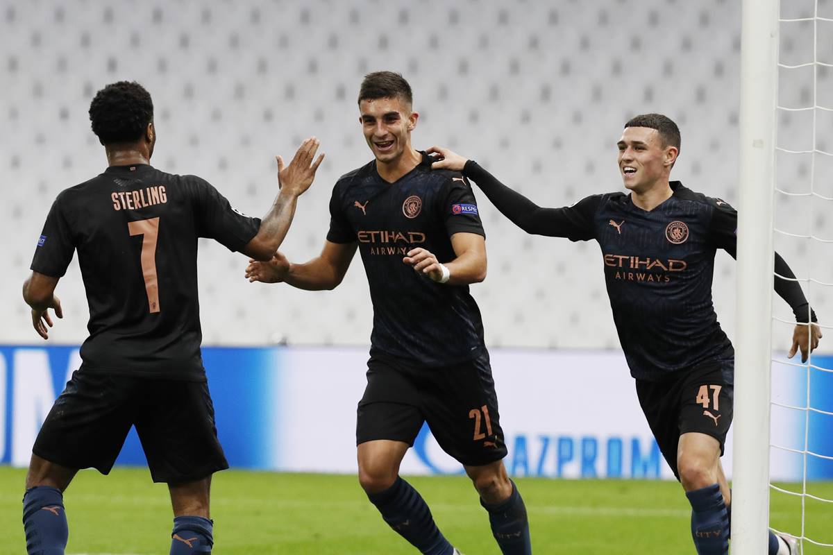 Manchester City's Ferran Torres celebrates scoring their first goal with Raheem Sterling and Phil Foden against Olympique Marseille at Orange Velodrome, Marseille, France. (Reuters image) Manchester City's Ferran Torres celebrates scoring their first goal with Raheem Sterling and Phil Foden against Olympique Marseille at Orange Velodrome, Marseille, France. (Reuters image)