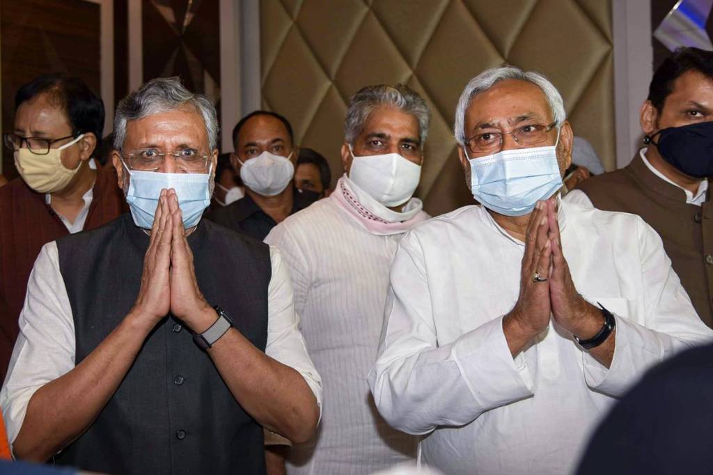 Bihar Chief Minister Nitish Kumar with BJP senior leader and Dy CM Sushil Kumar Modi during a press conference ahead of Bihar Assembly election, in Patna. (PTI/File Photo)