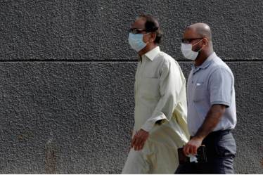 At least six persons died in the last one day, taking the death toll to 6,523, the ministry said, adding that the number of active patients was 8,588. (Photo source: Reuters)