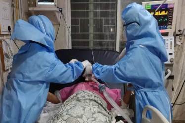 Of the 48,268 new infections registered the previous day, 78 per cent are from 10 states and UTs, it said. (File photo: IE)