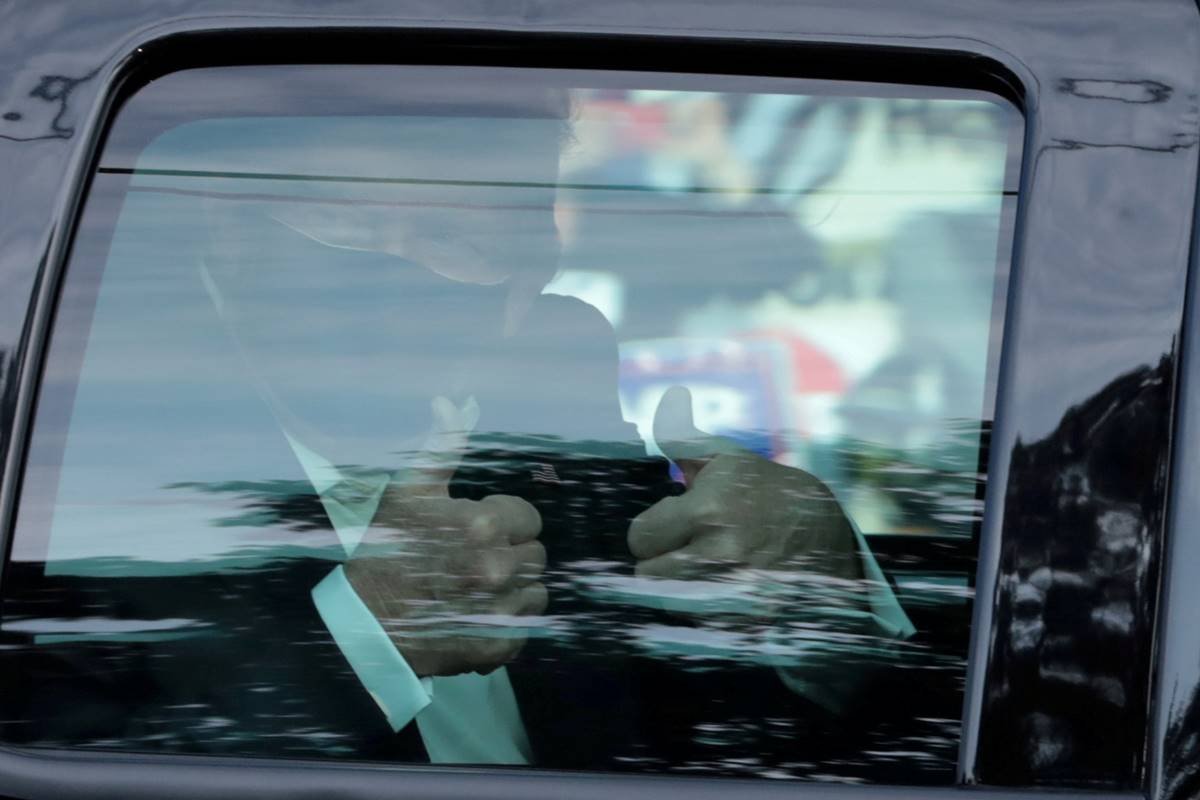 U.S. President Donald Trump gestures from a car as he rides in front of the Walter Reed National Military Medical Center, where he is being treated for the coronavirus disease (COVID-19) in Bethesda, Maryland, U.S. (Reuters/File Photo) U.S. President Donald Trump gestures from a car as he rides in front of the Walter Reed National Military Medical Center, where he is being treated for the coronavirus disease (COVID-19) in Bethesda, Maryland, U.S. (Reuters/File Photo)