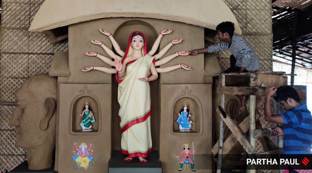 In this form the devi possesses ten arms (which can go up to 18 arms), and like Durga she is also associated with the colour red.