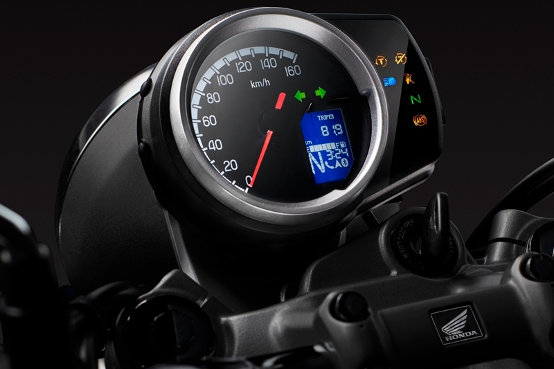 The CB350 features a segment-first digital-analogue instrument cluster which integrates details like HSTC, ABS, side stand indicator with engine inhibitor, ECO indicator, mileage features, HSVCS (smartphone connectivity), gear position indicator and battery voltage meter. The fuel efficiency details are displayed in three modes – real-time mileage, average mileage and distance to empty. <strong>Also read:</strong> <a href="https://www.financialexpress.com/auto/bike-news/honda-hness-cb350-vs-royal-enfield-classic-350-bullet-350-honda-cb350-price-honda-rebel-350/2094925/">Honda H’ness CB350 vs Royal Enfield Classic 350/Bullet 350: Engine, features, price</a>
