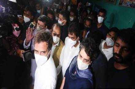 Congress leaders Rahul Gandhi and Priyanka Gandhi met the family Saturday evening and declared that they would fight for ensuring justice to them. (Photo source: IE)