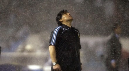 Copies of Italian newspapers headline on soccer legend Diego Maradona's death, in Rome. (AP Photo)