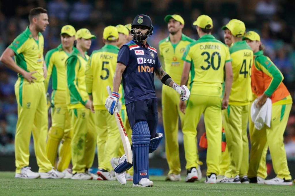 India's Virat Kohli walks from the field after he was dismissed for 89 runs during the one day international cricket match between India and Australia at the Sydney Cricket Ground in Sydney, Australia. (AP Photo)