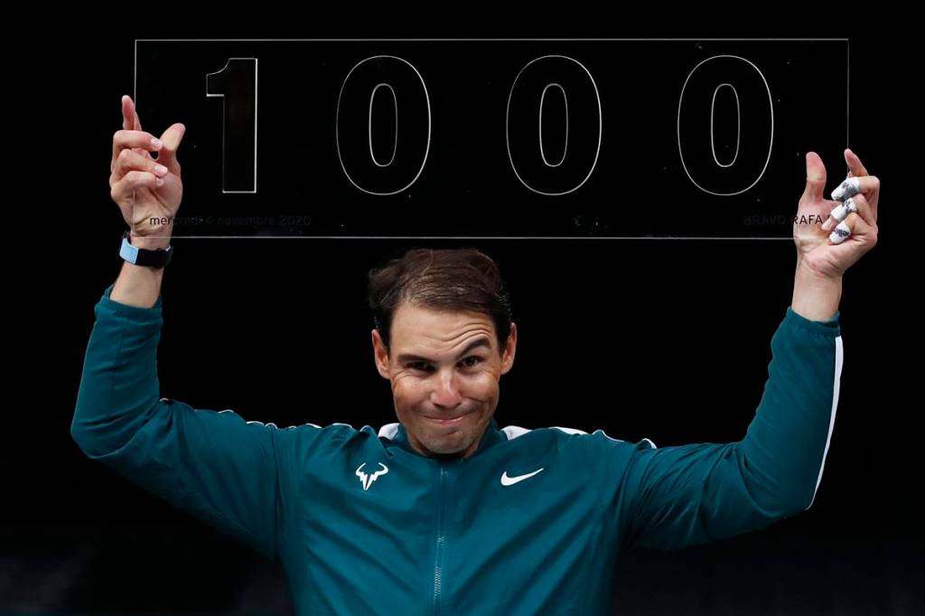 Spain’s Rafael Nadal celebrates after winning his second round match against Spain’s Feliciano Lopez and his 1000th professional match. (Reuters image)