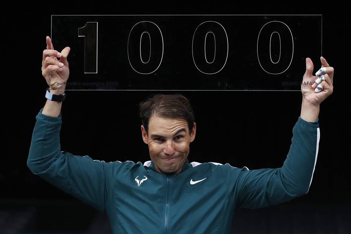 Spain’s Rafael Nadal celebrates after winning his second round match against Spain’s Feliciano Lopez and his 1000th professional match. (Reuters image)