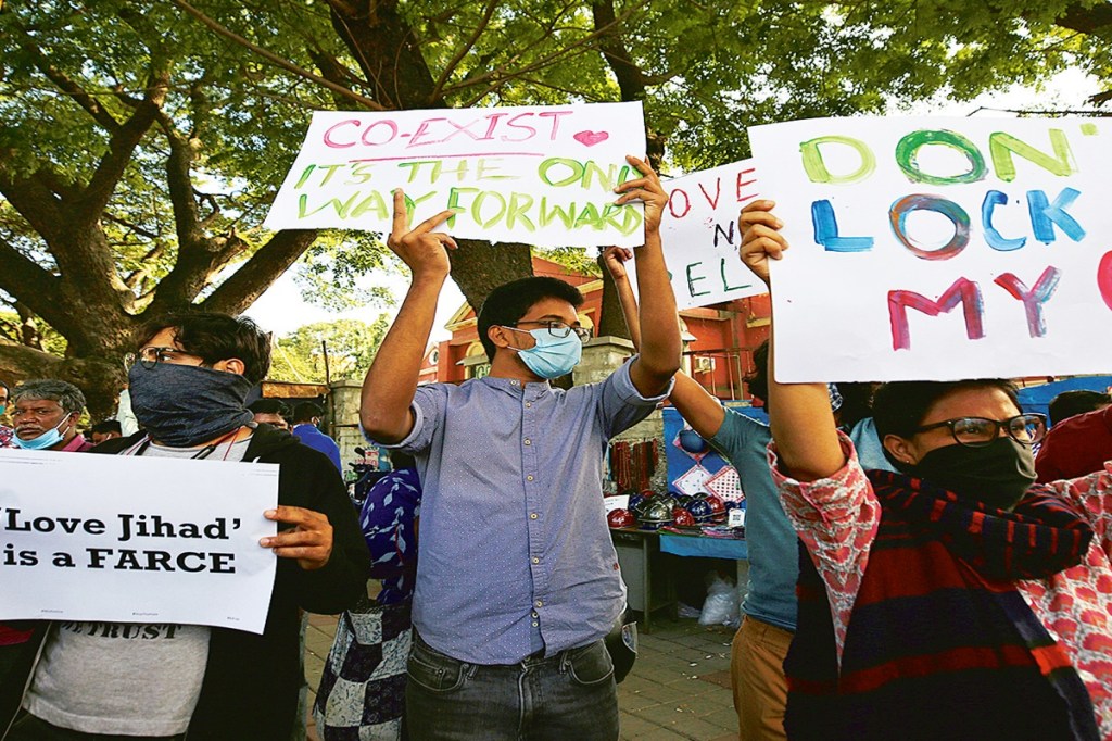 Indian activists protest against a legislation in Uttar Pradesh directed against inter-faith marriages (AP photo) Indian activists protest against a legislation in Uttar Pradesh directed against inter-faith marriages (AP photo)