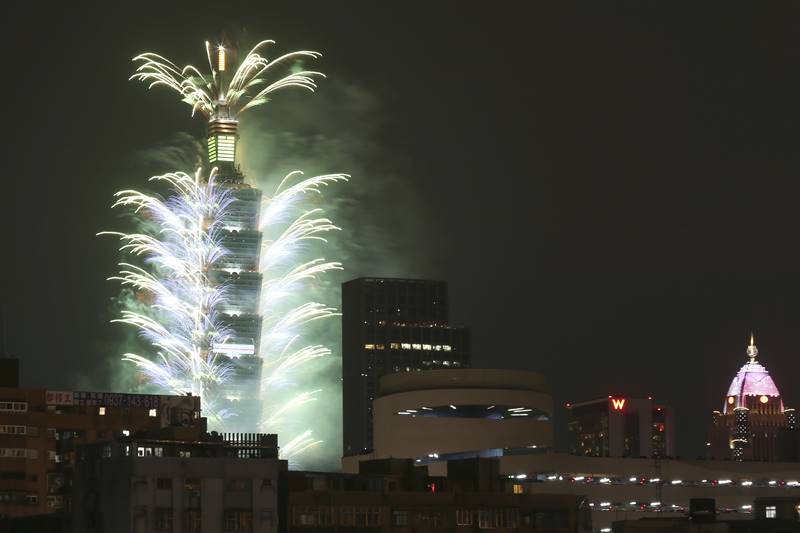 Fireworks detonate from the Taipei 101 building during the New Year's celebrations in Taipei, Taiwan