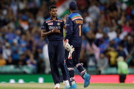 T Natarajan celebrates with KL Rahul after the dismissal of Australia's Glenn Maxwell during the third T20 international cricket match between Australia and India at the Sydney Cricket Ground in Sydney, Australia. (AP Photo) T Natarajan celebrates with KL Rahul after the dismissal of Australia's Glenn Maxwell during the third T20 international cricket match between Australia and India at the Sydney Cricket Ground in Sydney, Australia. (AP Photo)