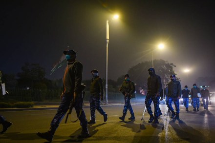 Paramilitary jawans patrol the Connaught Place area as security has been beefed up on the eve of New Year in New Delhi