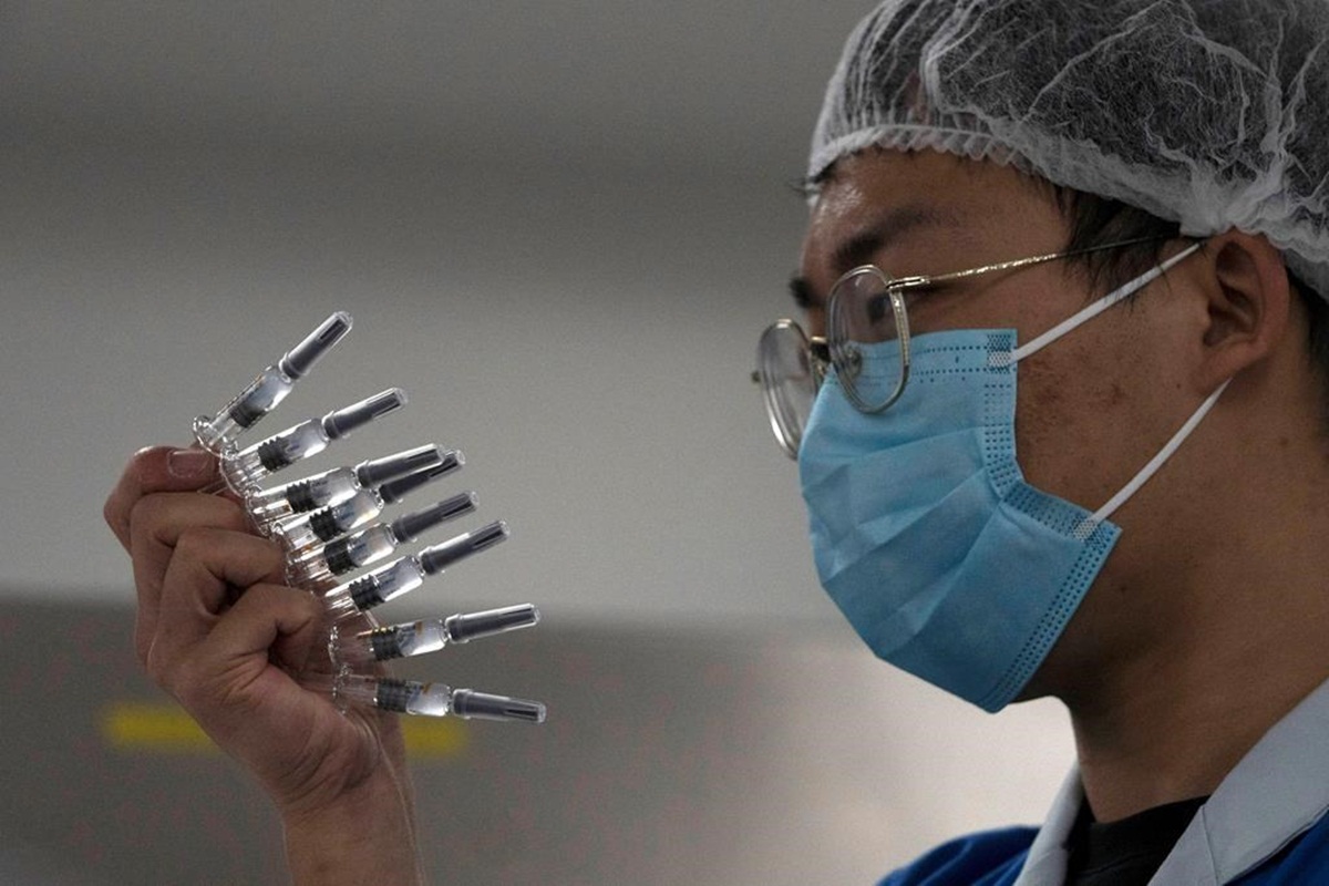 China's fledgling pharmaceutical industry has at least five vaccines from four producers being tested in more than a dozen countries including Russia, Egypt and Mexico. (Representational image: AP) China's fledgling pharmaceutical industry has at least five vaccines from four producers being tested in more than a dozen countries including Russia, Egypt and Mexico. (Representational image: AP)