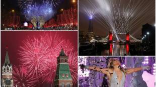 new year's eve, new year 2021, new year 2021 wishes, new year wishes, new year, new year 2021 images, 2021 happy new year, 2021 new year wishes, 2020 bye bye, sydney opera house, sydney harbour bridge, australia, sydney, auckland, new zealand, beijing, china, coronavirus, covid 19,coronavirus restrictions, covid 19 restrictions, new year curfew, new year restrictions,