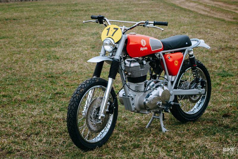 A Royal Enfield Bullet 500 custom-built as a scrambler and a quite a throwback to vintage MX-style Husqvarna motorcycles. With the Royal Enfield Bullet 500 missing the rear half of its bobber-style frame, David went to rebuild it with upright dynamics and added long YSS shocks. New upper fork sleeves and headlight mounts were fabricated and the top yoke redesigned for traditional risers. The new look was finished with a new headlight, a vintage-style number board, and classic handlebars.
