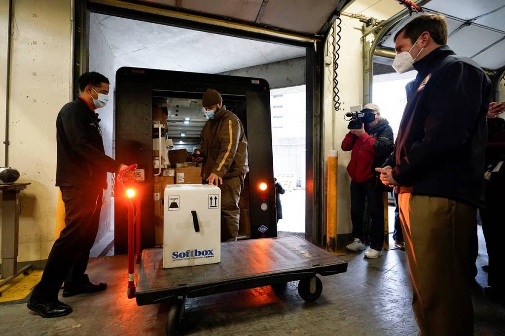 Kentucky governor Andy Beshear looks on as the Pfizer coronavirus disease (COVID-19) vaccine arrives at The University of Louisville Hospital in Louisville, Kentucky, U.S. (Reuters image) Kentucky governor Andy Beshear looks on as the Pfizer coronavirus disease (COVID-19) vaccine arrives at The University of Louisville Hospital in Louisville, Kentucky, U.S. (Reuters image)