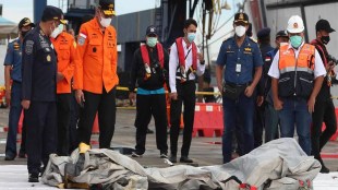 So far, the searchers have sent 74 body bags containing human remains to police identification experts who on Monday said they had identified their first victim, 29-year-old flight attendant Okky Bisma.