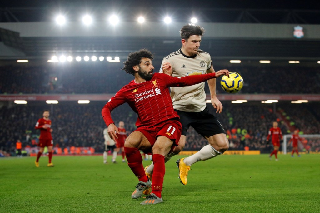 Liverpool's Mohamed Salah in action with Manchester United's Harry Maguire (file photo: reuters) Liverpool's Mohamed Salah in action with Manchester United's Harry Maguire (file photo: reuters)