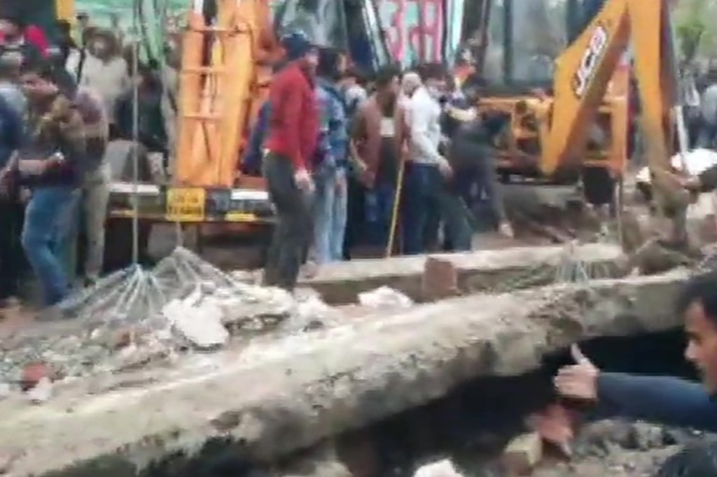 Rescue workers sifted through the rubble for hours to ensure that more victims were not trapped there. (ANI Image)