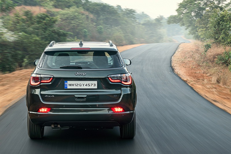 The rear is fairly the same as the old Compass. You continue to get the same set of LED tail lamps and the styling looks untouched. But, there is now an electronic boot opening and closing function.