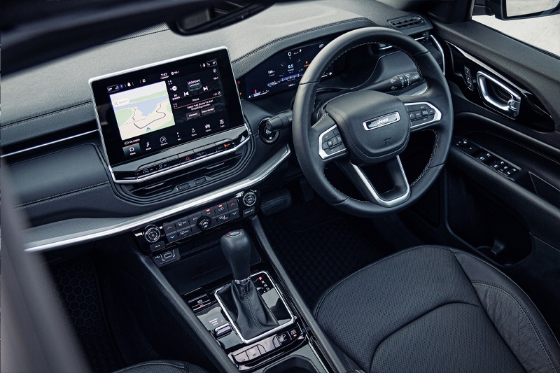 Jeep has given the new Compass a brand new interior with a redesigned dashboard. The Compass will feature a new 10.1-inch floating touchscreen infotainment system housed right in the middle. It comes with a new user-interface with UConnect5 that supports over the air updates. Additionally, the driver gets a new steering wheel while the dual-tone cabin has been left out for a simple all-black interior.