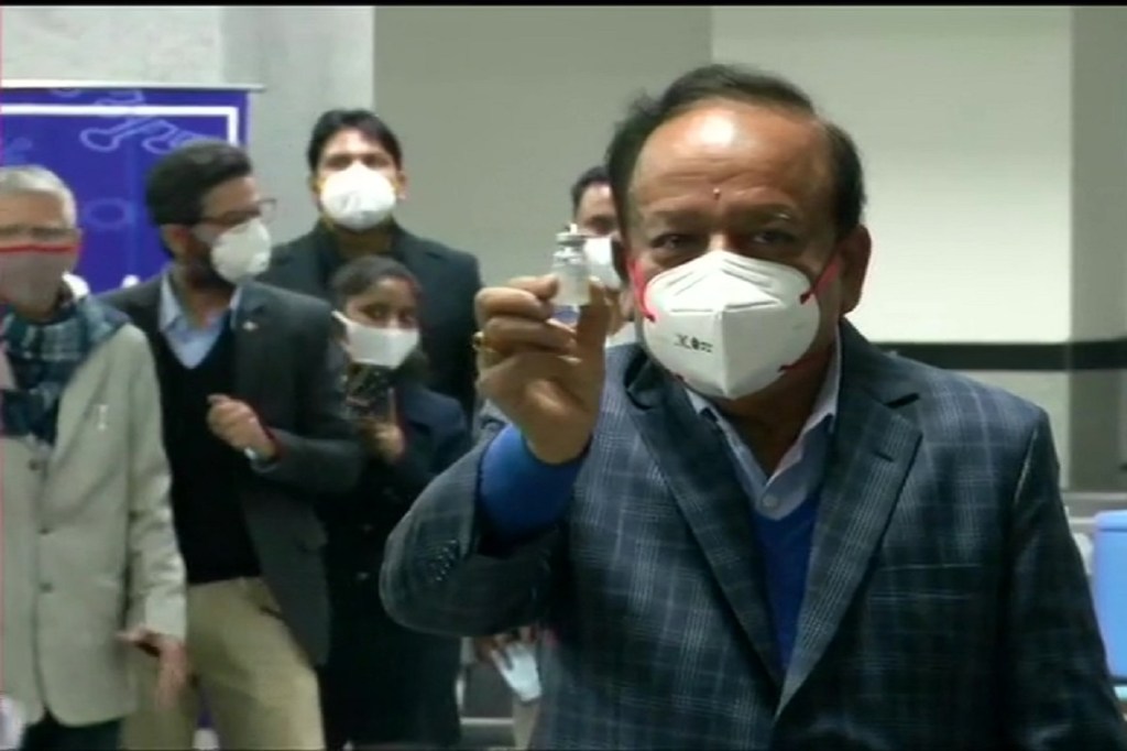 At the beginning of the first phase of the vaccination drive, the union minister was seen holding a dosage of Bharat Biotech’s Covaxin at AIIMS Delhi. Image: ANI