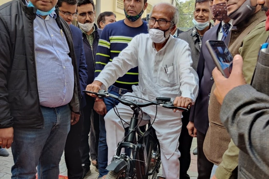 Pratap Sarangi trying out the new electric cycle by Nahak Motors