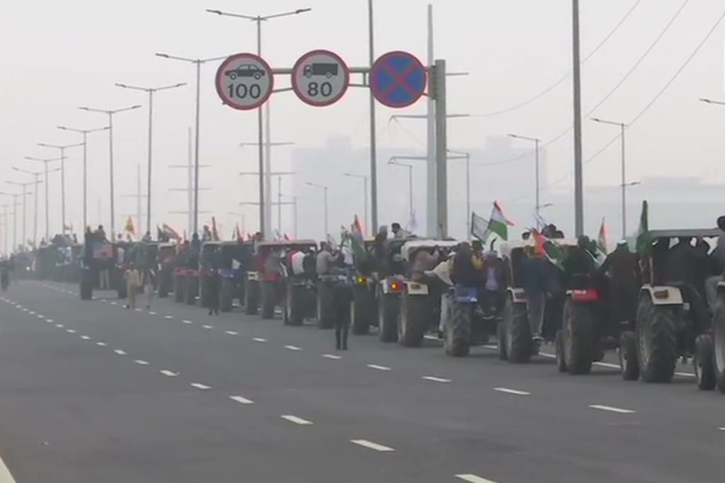 Farmers taking out tractor march against the three farm laws. (ANI)