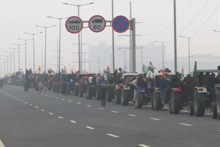 Farmers taking out tractor march against the three farm laws. (ANI)