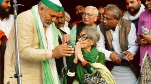 Tara Gandhi Bhattacharya, granddaughter of Mahatma Gandhi, with BKU spokesperson Rakesh Tikait at farmers' protest in Ghazipur, Delhi (PTI Image)