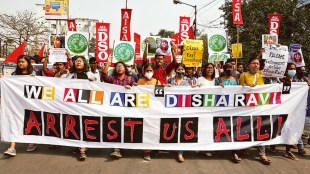 Demonstrators protest against the arrest of 22-year-old climate activist Disha Ravi, in Kolkata (Reuters image)