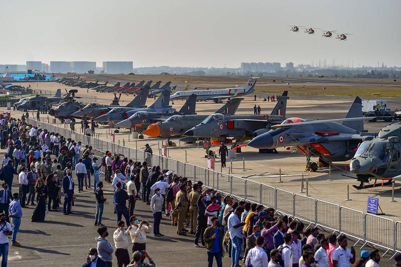 Aero India 2021, Aero India, Aero India 2021 theme, Aero India 2021 bangalore, Aero India 2021 bengaluru, Aero India 2021 live, Aero India 2021 images, Aero India 2021 photos, Aero India 2021 pics, rajnath singh, defence, Tejas, Sukhoi, Rafale, Hawk, Surya Kiran aircraft, Bengaluru Air Show