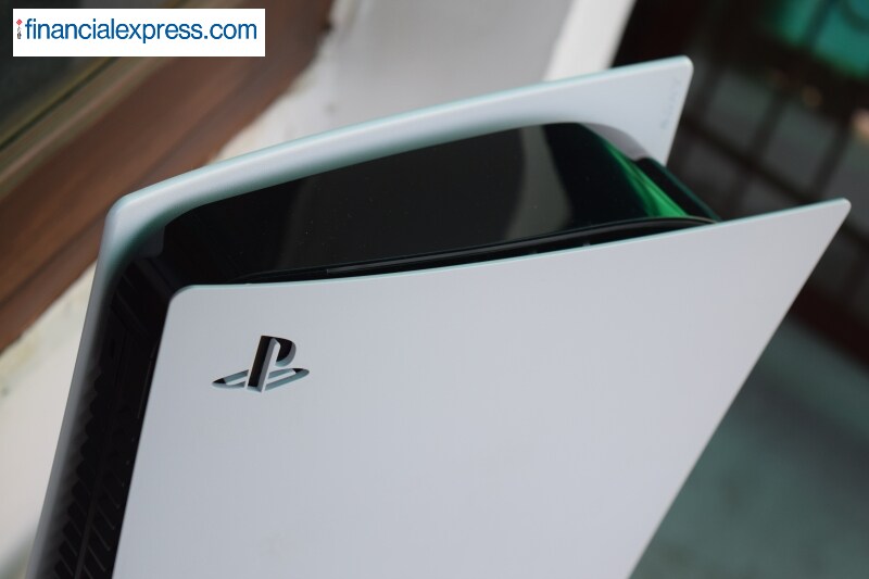 The PS5 is powered by a custom AMD Zen 2 CPU paired with AMD RDNA 2 GPU and 825GB on-board SSD (only 667GB is available for use though). The PS5 opts for "variable" frequencies, for the CPU and GPU. The console supports expandable storage with regular NVMe PC drives. The expansion slot rests inside the console but it is not available at launch. At this point of time, you can connect your existing external hard drive to it and play PS4 games directly off it. The PS5 has a hi-Speed USB Type-A port, two SuperSpeed USB-A ports, USB Type-C SuperSpeed port, Ethernet jack, HDMI 2.1 port and an AC adapter. (Photo credit: Saurabh Singh/Financial Express)