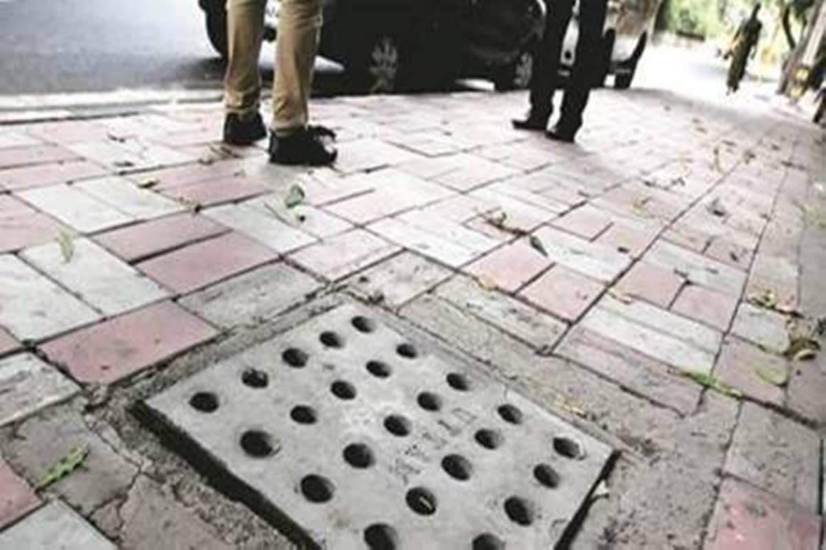 That stamping is because of rules of origin requirements for imported manhole covers.