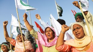 Farmers shout slogans and wave flags during the ongoing farmers' protest in Haryana (Reuters image)