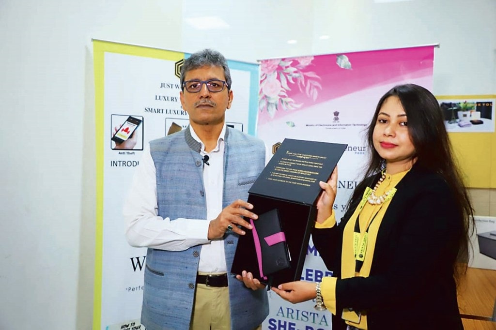 Omkar Rai, DG - STPI, (L) launches SheBot wallet with Arista Vault founder Purvi Roy