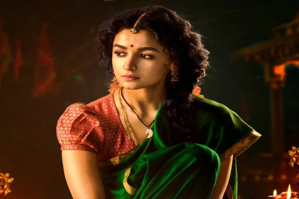 Alia Bhatt looks stunning as Sita from #RRR. Check inside for a full look. @aliaa08 @RRRMovie #AliaBhatt https://www.financialexpress.com/entertainment/alia-bhatt-gifts-us-regal-sita-look-on-her-birthday-celebrations-check-out-ss-rajamoulis-rrr-poster-now/2212853/