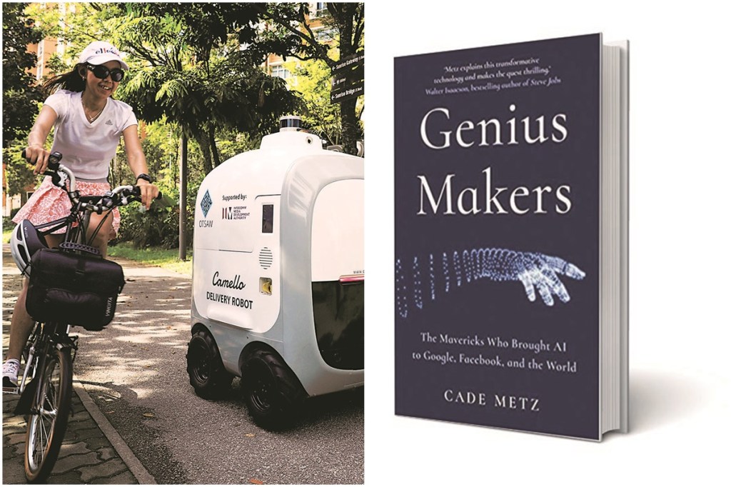 A cyclist passes an autonomous grocery delivery robot in Singapore earlier this month (Reuters image)