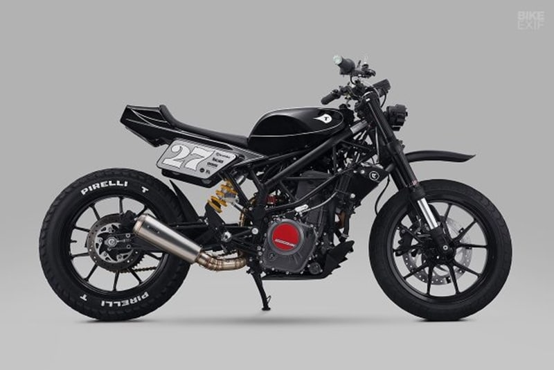 Kimo wanted a toy to play with during weekends but during the build of his motorcycle, he found the sounds in the workshop interesting. Thrive and Kimo then got into a plan for a custom build and music together and called it 'The Sight'. As for the bike, it had to be a street-legal scrambler. The stock bodywork didn’t fare as well though. Thrive traded plastic for metal, hand-shaping a new aluminum fuel tank, tail section, side panels and front fender. The stock airbox had to go too, and Thrive fitted a K&N filter underneath the tank instead. (Source: Bikeexif)