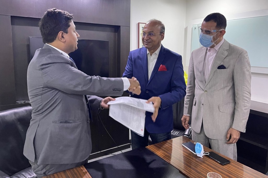 Uday Narang, Chairman of Omega Seiki Mobility and Dr Deb Mukherji, Managing Director, Omega Seiki Mobility with Kuldeep Gupta, VP Strategic Partnership, C4V 