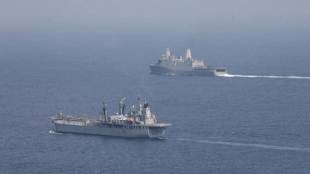 US Navy, paramilitary Revolutionary Guard, warning shots on Iran, a patrol in the Persian Gulf,, tracer round racing, USS Firebolt