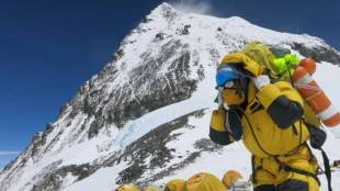 coronavirus outbreak on Mount Everest , expert mountsineeerring guide, sherpas testing positive, 100 people minimum positive for COVID in base camp, permits forr climbing mt everest