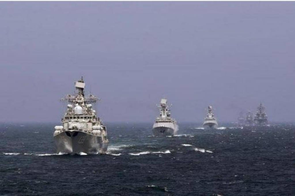 China's Shandong aircraft carrier group, annual exervise at South China Sea, People's Liberation Army , Chinese defence ministry, man-made islands in the disputed waters