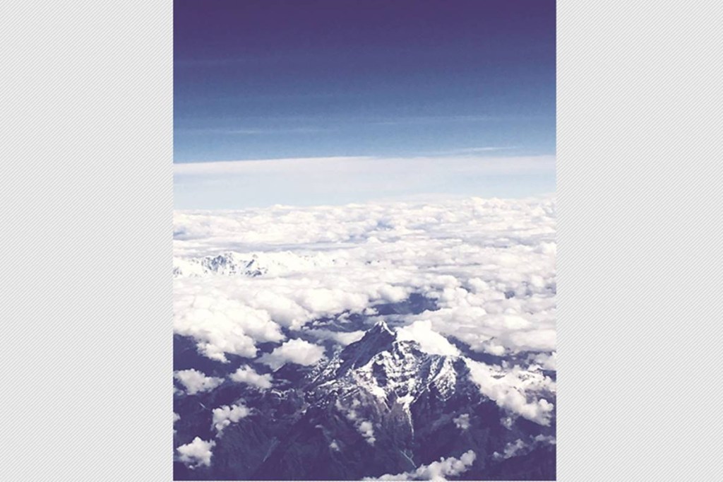 A view of Mount Everest from an airplane Photo: Ivinder Gill