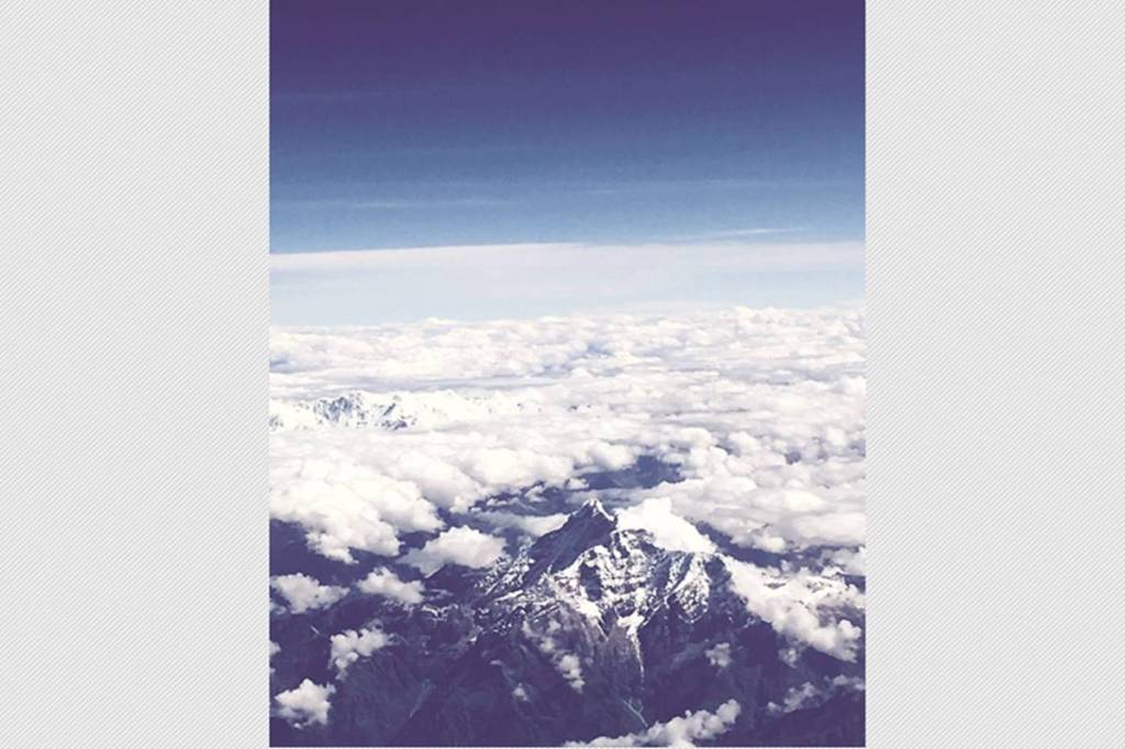 A view of Mount Everest from an airplane Photo: Ivinder Gill