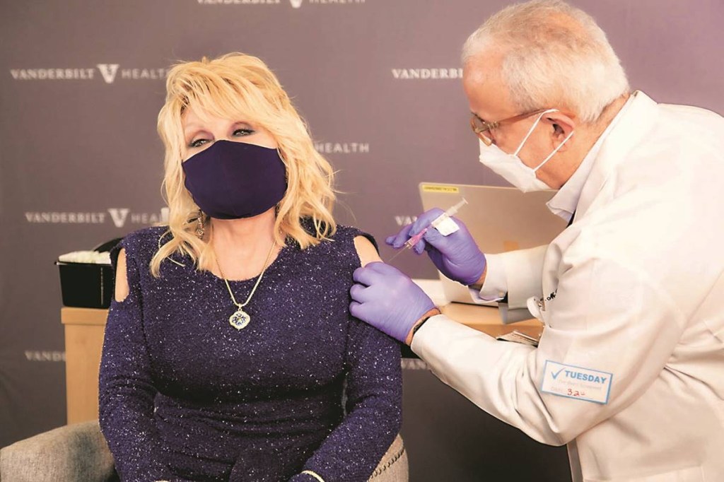 A file photo of Dolly Parton getting coronavirus vaccination @Dollyparton, via Reuters