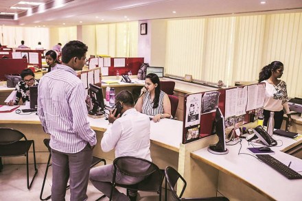 An employee attends to customers at a Housing Development Finance Corp. (HDFC) bank branch in Mumbai, India, on Monday, June 3, 2019. The Reserve Bank of India rate decision is scheduled for June 6. Photographer: Dhiraj Singh/Bloomberg An employee attends to customers at a Housing Development Finance Corp. (HDFC) bank branch in Mumbai, India, on Monday, June 3, 2019. The Reserve Bank of India rate decision is scheduled for June 6. Photographer: Dhiraj Singh/Bloomberg