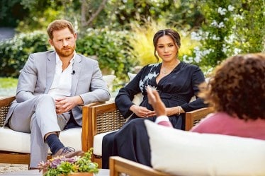 Prince Harry and Meghan Markle in conversation with Oprah Winfrey earlier this year AP